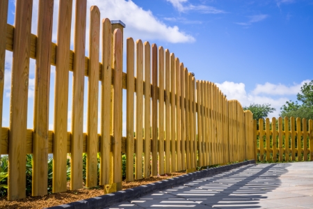 Choosing the Right Fence: A Comparison of Wood, Metal, and Composite Options